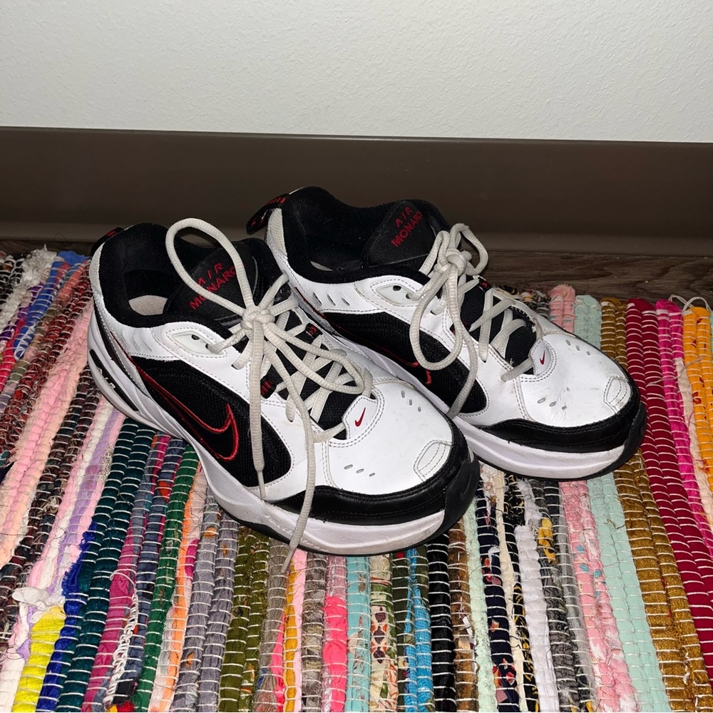 White, Red, and Black Nike Air Monarch’s
